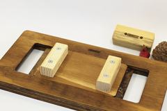 Primo piano del carrello di Edge Duel XL e delle tacche in pino